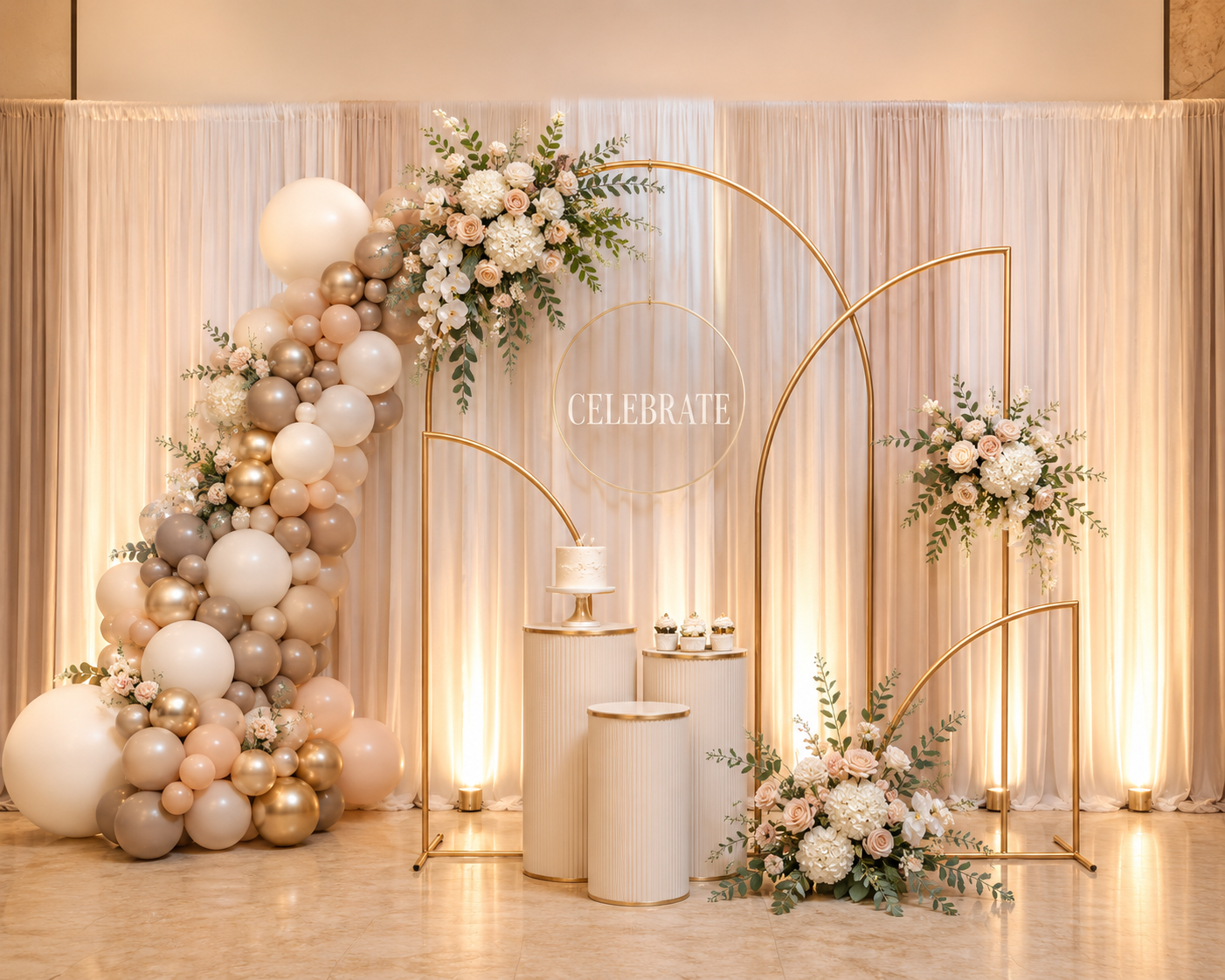 Premium gold arch event backdrop with florals and drapery