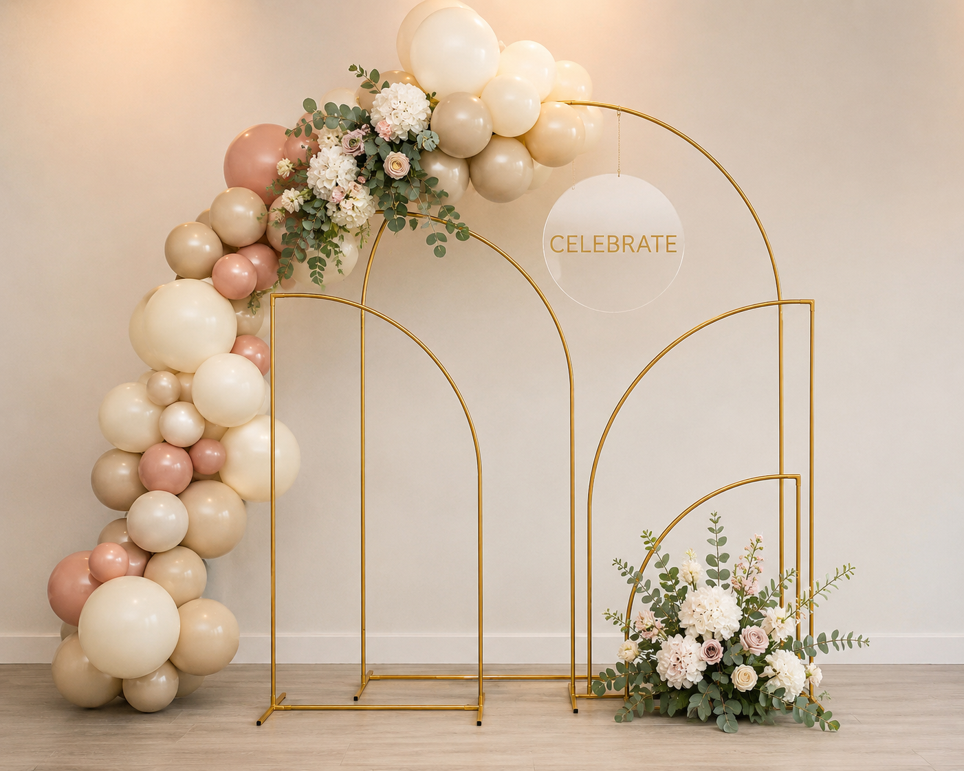 Signature gold arch backdrop styling